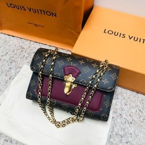 Louis Vuitton “Victoire” crossbody bag